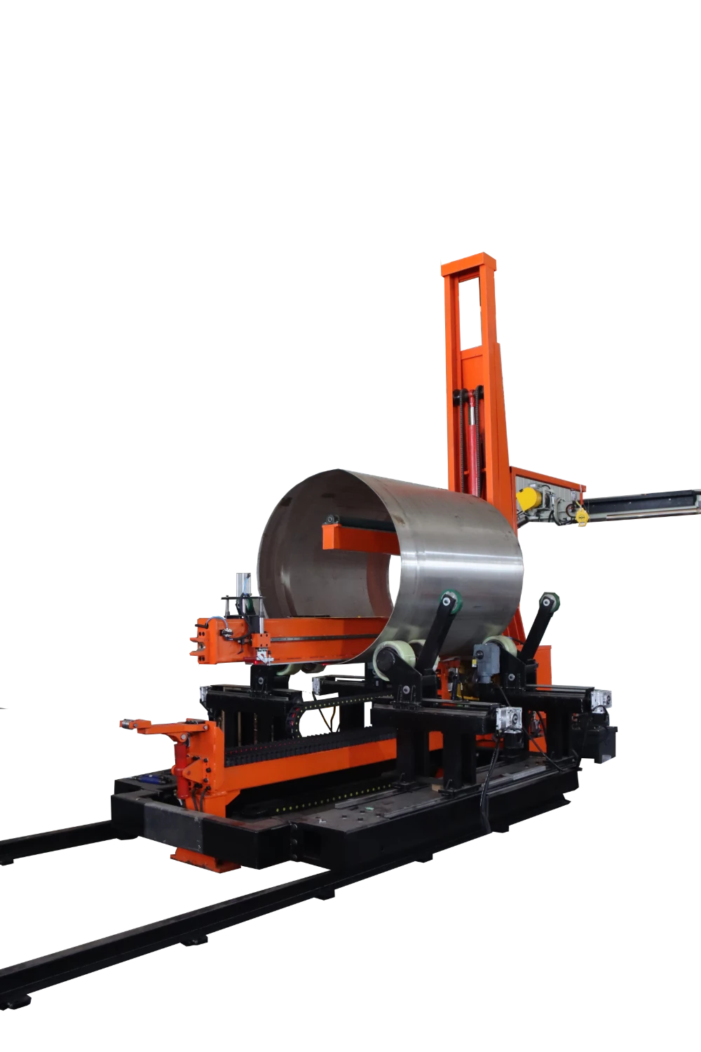 Side view of a circumferential weld finishing machine with a cylindrical vessel on roller supports
