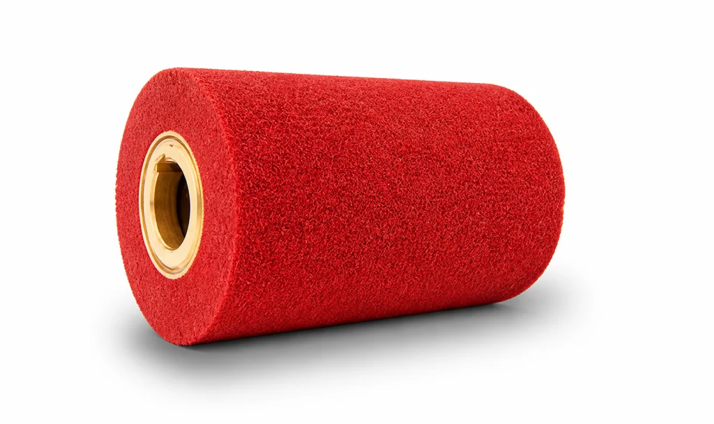 Non-woven abrasive roller for blending and finishing metal surfaces